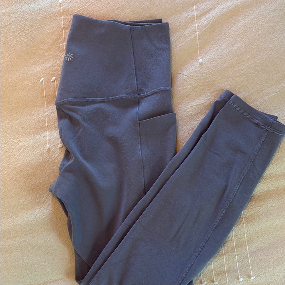 Athleta Salutation pocket II 7/8 tight